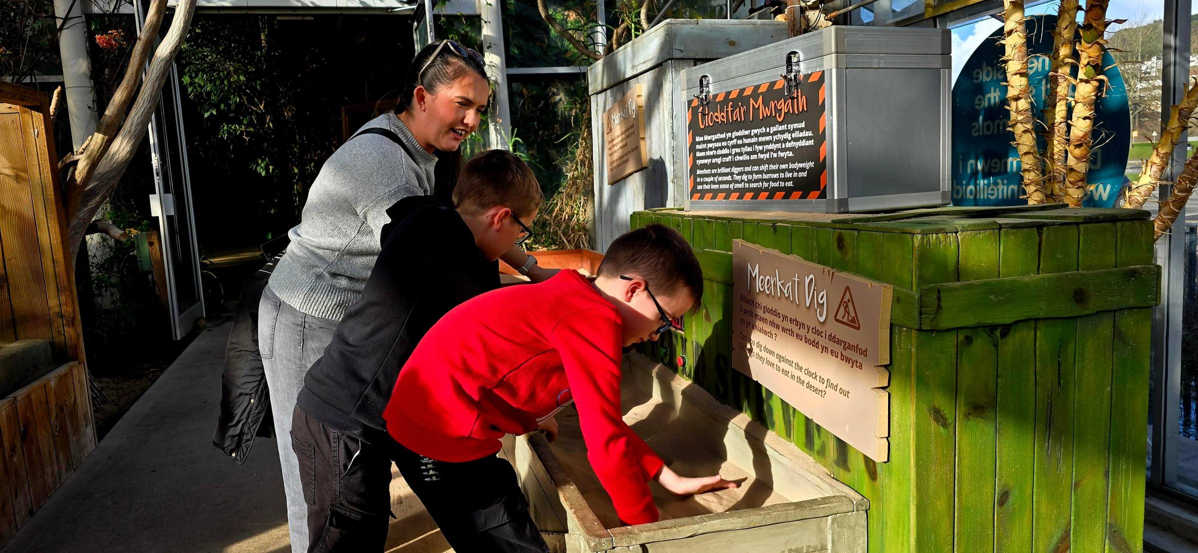 a man and a woman sitting on a bench