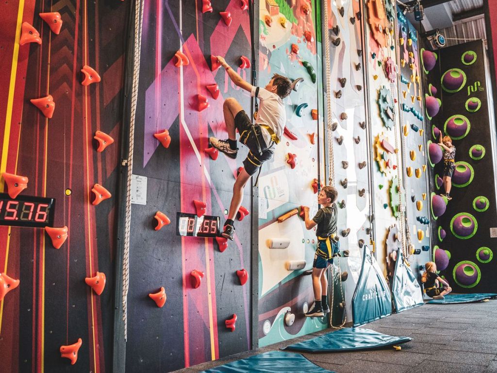 a child climbing indoors at Crazy Climb